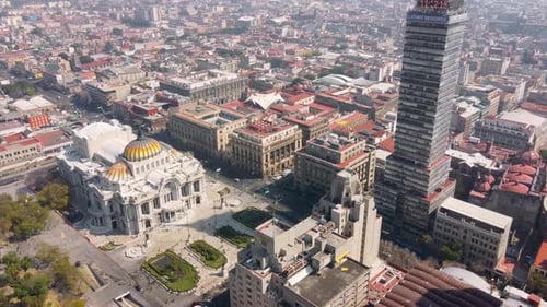 Aerial view of Mexico City, light trails and Bellas Artes and torre latinoamericana