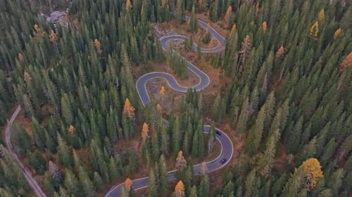 Aerial view of iconic Snake Road winding through Dolomites mountains