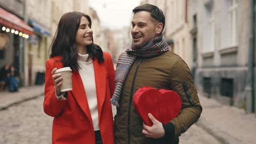 Happy Couple in Love Caucasian Family Walking Around the City Talking Spending Time Together