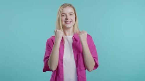Excited Woman Cheering and Celebrating Success