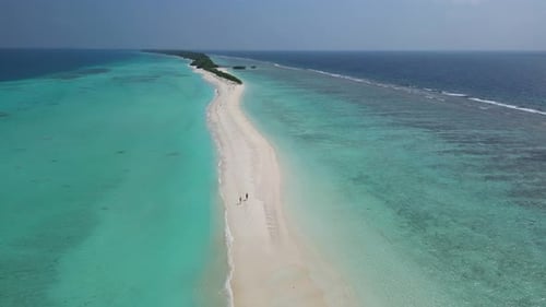 Stunning Blue Ocean and Sandy White Island Maldives Top Drone Aeral View Deserted Hidden Beach