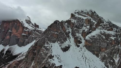 Rocky Snow Mountains and Clouds