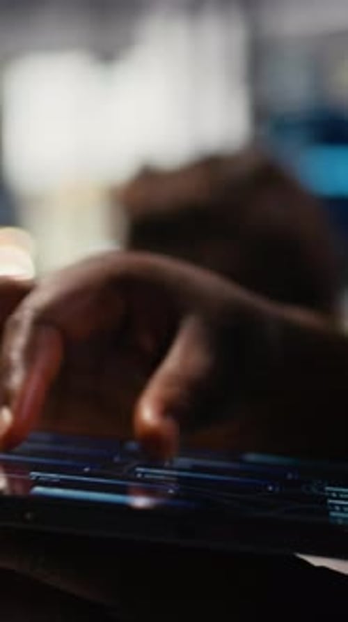 Vertical Video Close Up of Tablet Used By Admin in Office Doing Software Development