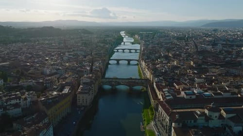 Aerial Panoramic View of Arno River Flowing Through Historic Town