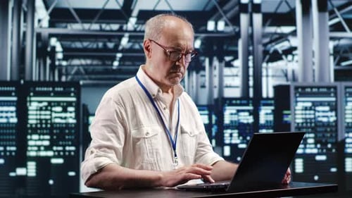 Technician Optimizing Data Center