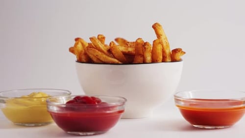 Bowl of French Fries with Dipping Sauces