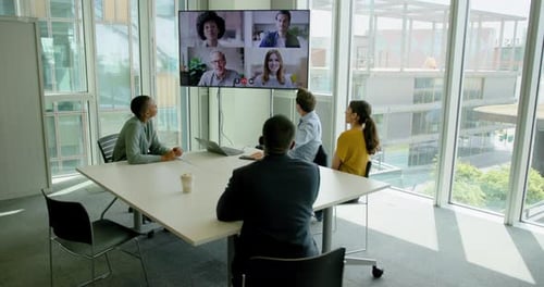 Businesspeople Having a Video conference in a Office Meeting room