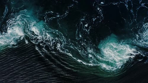 Waves of Water of the River and the Sea Meet Each Other During High Tide and Low Tide