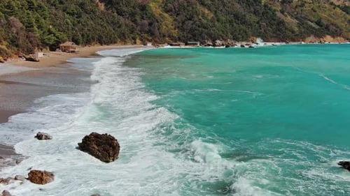 Sand Beach and Turquoise Sea Waves
