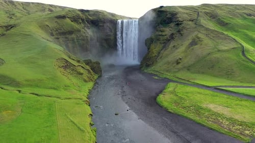 Aerial slow motion view of breathtaking Skogafoss waterfall, Iceland