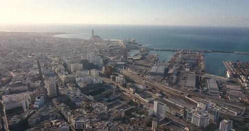 Aerial View of Coastal City and Mosque