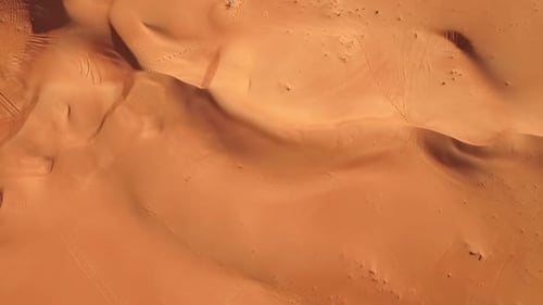 Spectacular Desert Aerial Shot with Rolling Sand Dunes in 4K