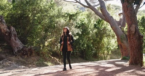 Woman, hiking and outdoor adventure in nature with bag for tourist exploration