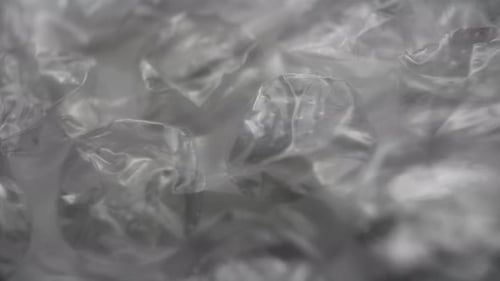 Abstract bubble wrap texture background with slow camera movement