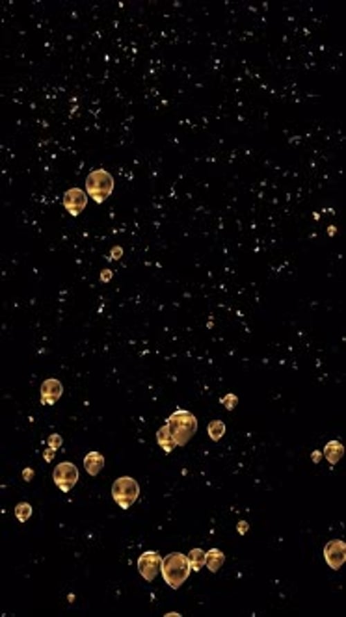 Celebratory Golden Balloons and Confetti Falling Loop
