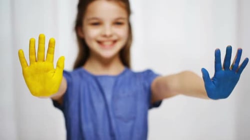 Education, School, Creativity, Art and Painting Concept - Smiling Little Student Girl