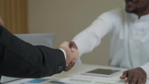 Successful Businessmen Handshake Meeting in Office