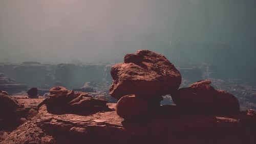 Large Rock Perched on Rocky Hillside