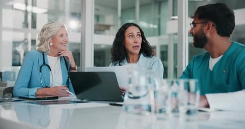 Documents, medical and teamwork with people in boardroom of hospital for meeting