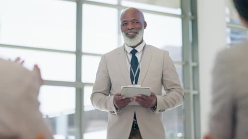 Presentation, conference and black man on tablet with applause in audience for success or support