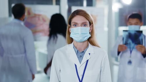 Caucasian Young Adult Woman Doctor Professional Physician Medical Worker Crossing Arms Posing