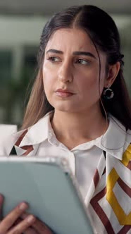 Thinking, tablet and business woman in office for planning, research report and proposal