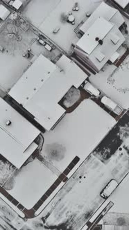 Small Town Winter Scene Snow Covered Roofs After Snowfall From Above