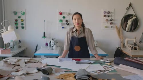 Portrait of Biracial Female Craftswoman in Leather Workshop