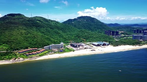 Aerial Top view of a transparent blue sea with beautiful waves at sunny day in summer. air of ocean