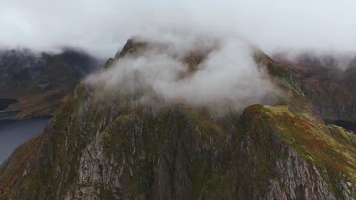 Epic Overflight Aerial Glimpse of Lofoten's Mountainside and Its Majestic Steep Peaks