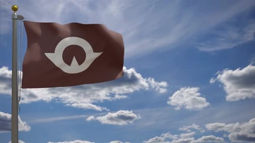 Realistic Waving Flag with Stylized Emblem Against Blue Sky