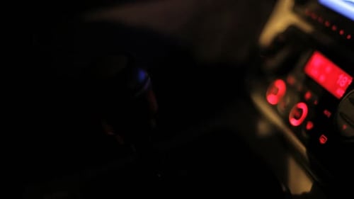 Car Gear Shift Close-up at Night