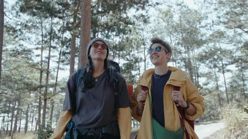 Girls Walking on Hiking Trail in Woods and Enjoying Nature