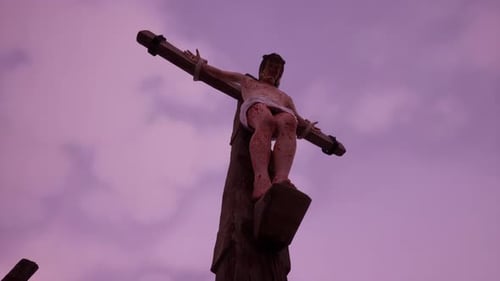 Crucifixion of Jesus Christ with Dramatic Purple Sky