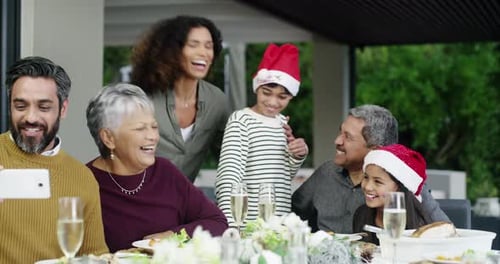 4k video footage of a three generational family taking a selfie on Christmas
