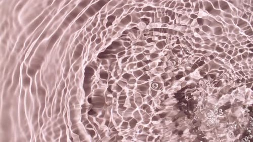 Pure Water with Reflections Sunlight in Slow Motion Water Surface Texture Top View Sun and Shadows