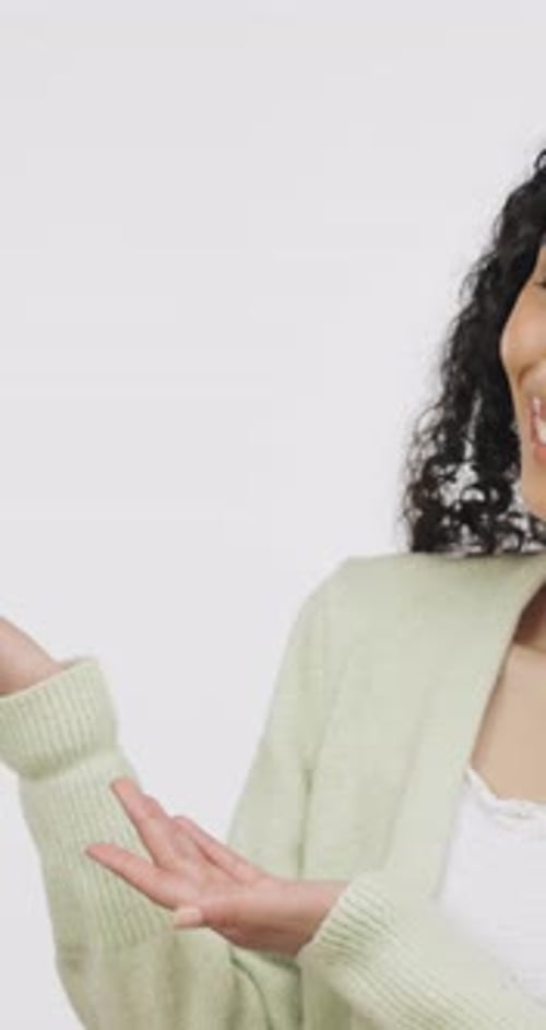 Student, pointing and woman with presentation in studio, smile or recommendation for higher