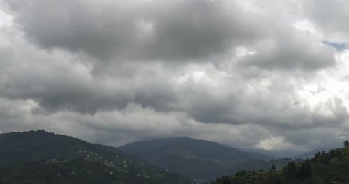 Time-Lapse of Mountains with Fast-Moving Clouds
