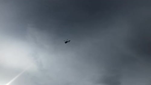 A Police helicopter searches from high