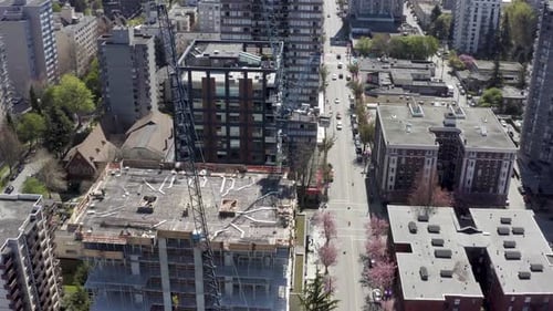 Aerial during COVID restrictions over Downtown Vancouvers English Bay wjile city is quiet due to Soc