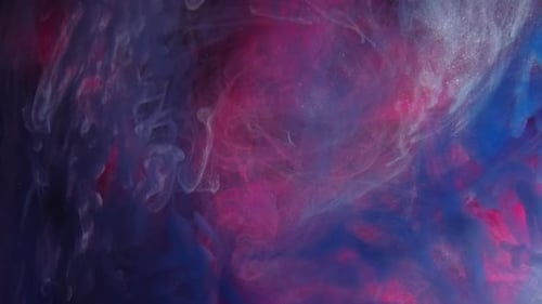 Abstract Cosmic Cloud of Ink Colors Swirling