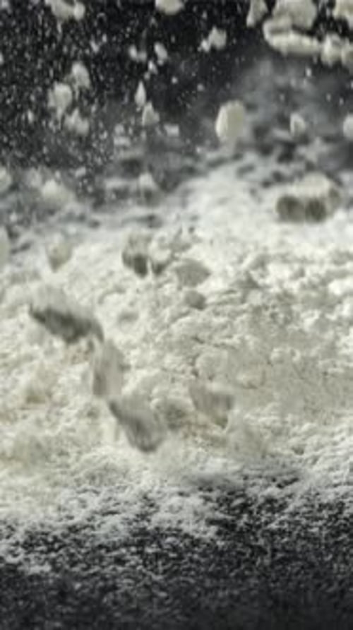Flour Falls on the Kitchen Table Filmed on a Highspeed Camera at 1000 Fps