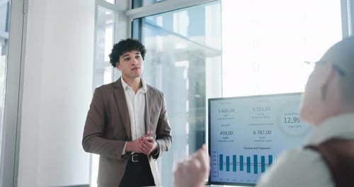 Business, presentation and man in meeting, financial agency or graphs for company revenue