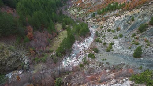 Mountain creek water streaming through cliffs on beautiful peaceful valley in Europe