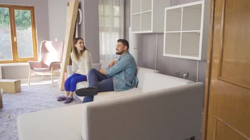 Young Couple Excited With New Flat.