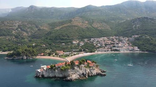 Aerial View of the Famous Island of Sveti Stefan and Its Surrounding Beaches and Mountains