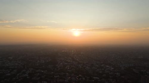 Aerial footage of a bright sunrise over Mexico City