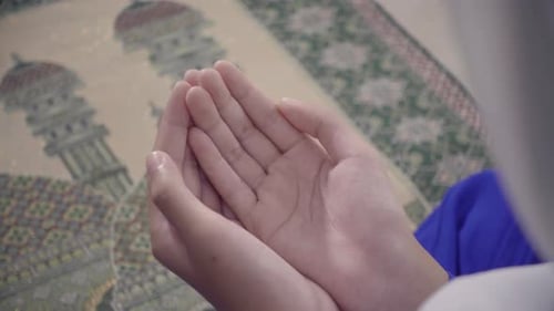 Hands of an Asian Muslim in prayer.