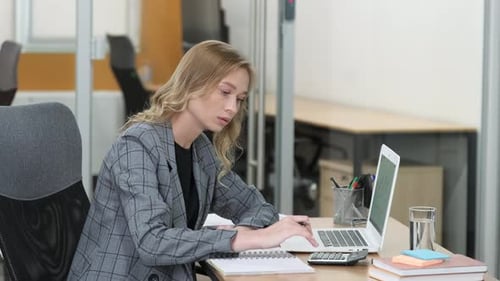 Young Woman Working at Modern Office