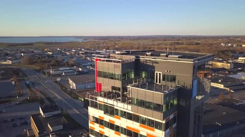 Aerial View of Concrete Frame of Tall Glass Apartment Building Under Construction in a City